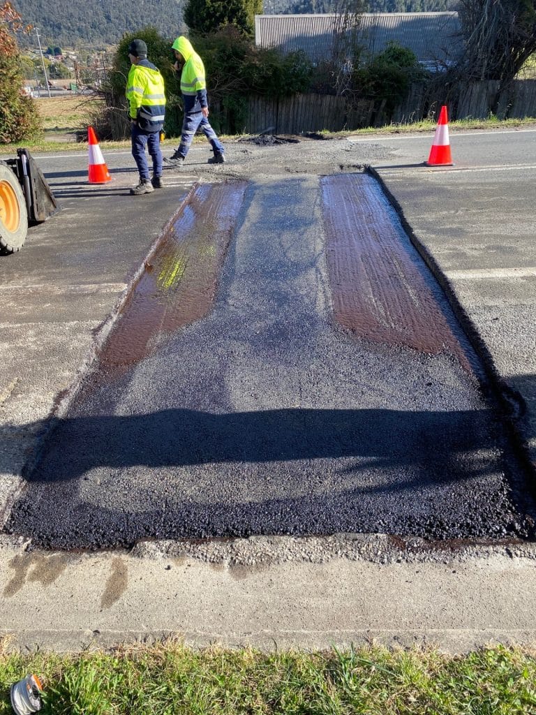 Asphalt base preparation and tac coat placement prior to asphalt placement – Bells Line of Road, Lithgow NSW